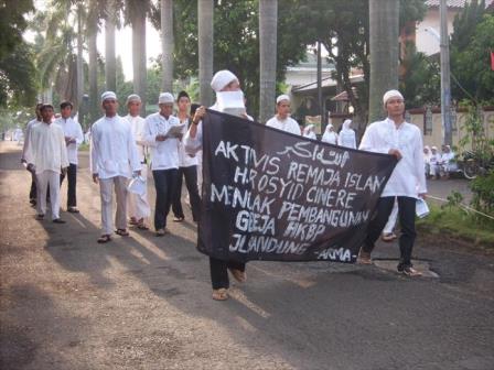 Muslims protest the building of a church in Java, Indonesia; December 2010.