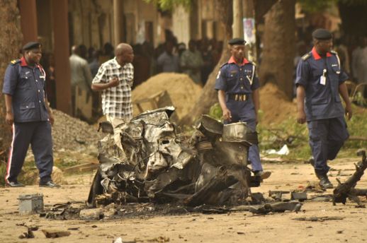 Aftermath of suicide bomb attack in Kano, Nigeria, on Sunday, May 18, 2014