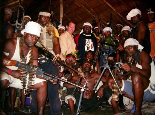 Stephen Davis in 2004 with Niger Delta rebels, on the eve of a peace deal with the government