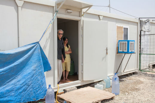 The seven members of the Abada family -- the parents, four children and one daughter-in-law -- live in this portable shelter.